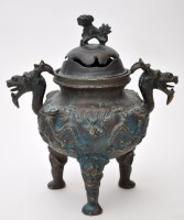 Lot 578 - A Chinese bronze censer and cover, cast with...