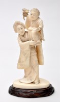 Lot 583 - Japanese ivory and bone figure group, Meiji...