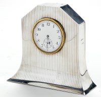 Lot 612 - A George VI silver cased mantel clock, by J....