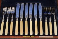 Lot 623 - A George V set of six fish knives and forks,...