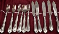 Lot 639 - Six Edwardian fish forks and five fish knives,...