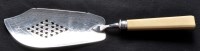 Lot 677 - A George III fish slice, with double struck...