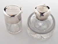 Lot 691 - A George V cut glass and silver mounted...