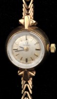 Lot 788 - Omega: a 1960's ladies 9ct. gold bracelet...