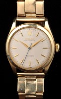 Lot 802 - Rolex: a 9ct. gold chronometer wristwatch,...