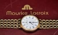 Lot 823 - Maurice Lacroix: an 18ct. yellow gold cased...