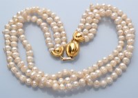 Lot 829 - A triple row baroque cultured pearl necklace,...