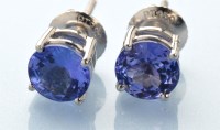 Lot 837 - A pair of ''Rhapsody'' tanzanite stud earrings,...