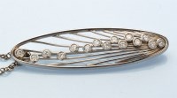 Lot 863 - A diamond set white metal brooch, London...