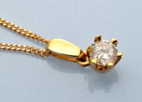 Lot 865 - A single stone diamond drop pendant, the...