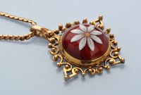 Lot 868 - A 9ct. yellow gold and enamel pendant, by S. &...