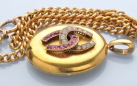 Lot 878 - A Victorian yellow metal locket, the oval...