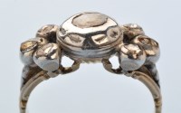 Lot 881 - An 18th Century diamond ring, the central rose...