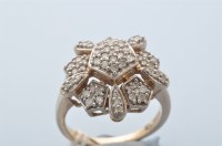 Lot 916 - A diamond set dress ring, with pentagonal...