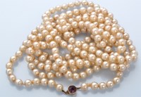 Lot 929 - A single uniform row cultured pearl necklace,...