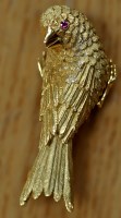 Lot 937 - A 14ct. yellow gold bird pattern brooch, by...