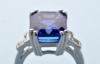 Lot 954 - An impressive tanzanite and diamond ring, the...