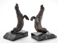 Lot 961 - A pair of 20th Century patinated copper...