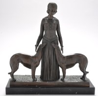 Lot 970 - Model after Chiparus: brown patinated female...