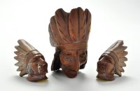 Lot 1015 - Three carved and stained wooden pipe bowls,...