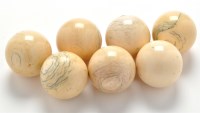 Lot 1023 - Seven 19th Century unstained ivory billiard...