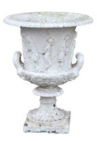 Lot 1030 - An early 20th Century white painted cast iron...