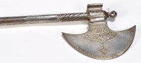 Lot 1067 - A 19th Century Persian steel hand axe, the...