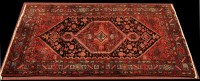 Lot 1248 - A Shiraz type rug, the central medallion and...