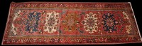 Lot 1261 - A north west Persian runner, the claret field...