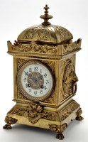 Lot 1281 - A late 19th Century French brass mantel clock,...