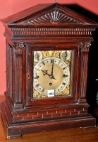 Lot 1292 - A late 19th Century oak bracket clock, the...