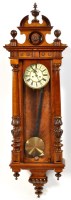Lot 1302 - A Viennese style walnut wall clock, the...