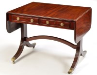 Lot 1310 - A Georgian style mahogany sofa table, the...