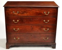 Lot 1349 - A George III mahogany secretaire chest, the...