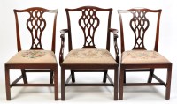Lot 1368 - A set of six George III mahogany dining chairs,...