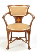 Lot 1370 - An Edwardian inlaid mahogany elbow chair,...