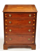 Lot 1376 - A 19th Century inlaid mahogany chest of four...