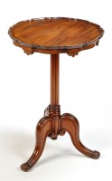 Lot 1377 - A mahogany tip-up-top occasional table, the...
