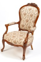 Lot 1380 - A Victorian walnut easy chair, the flower...