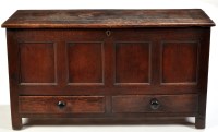 Lot 1385 - An 18th Century oak mule chest, the hinged...