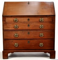 Lot 1399 - A George III walnut bureau, the fall-flap...