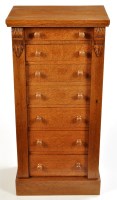 Lot 1401 - A late Victorian oak Wellington chest, fitted...