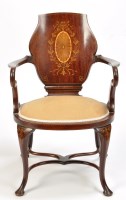 Lot 1405 - An Edwardian inlaid mahogany elbow chair, the...