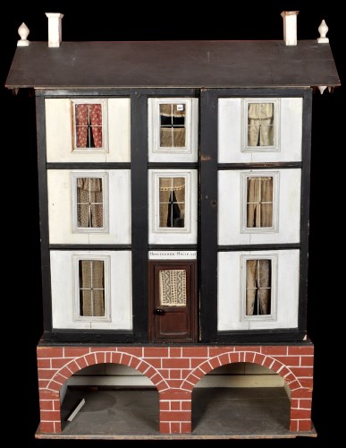 Lot 1407 - A large doll's house, with detachable roof...
