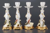 Lot 303 - Four Moore Brothers candlesticks of cactus...