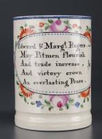 Lot 345 - A Creamware frog mug with hand-painted floral...