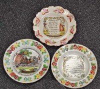 Lot 404 - Three moulded and coloured children's plates,...