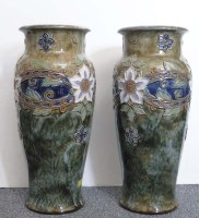 Lot 413 - Royal Doulton Lambeth: a pair of vases, with...