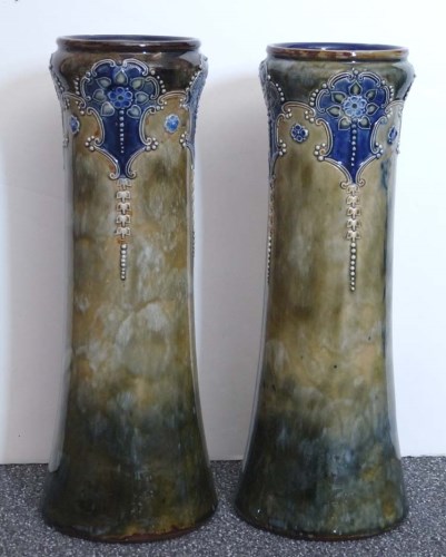 Lot 414 - Royal Doulton Lambeth: a pair of vases, with...