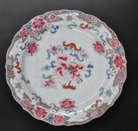 Lot 451 - A Famille Rose charger, typically decorated...